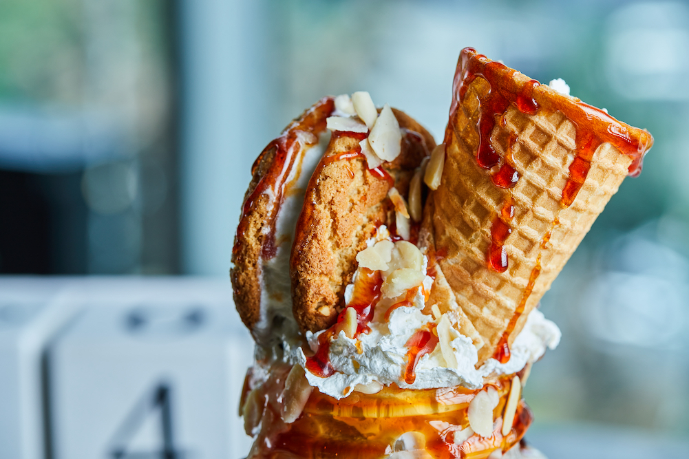 milkshake with waffle cone and oatmeal cream pie on top