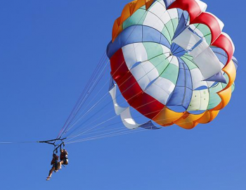 blue sky parasail water sports